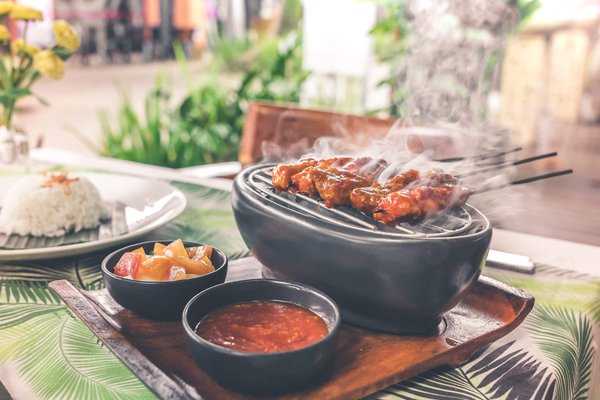 des astuces pour aménager un jardin avec un espace barbecue ou une cuisine extérieure